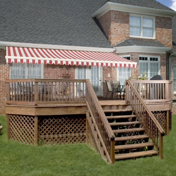A red and white retractable awning by the Garret Glass team