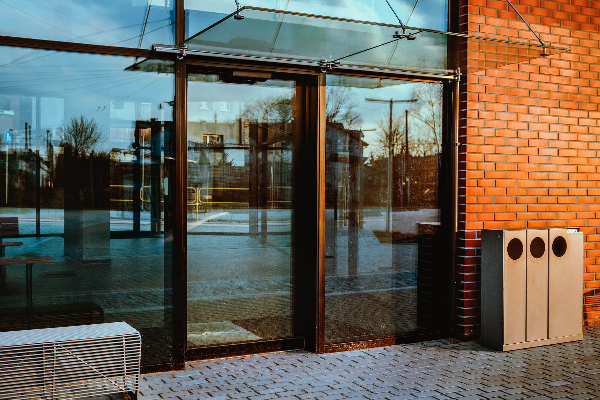 A glass storefront in the early morning.